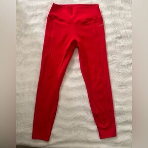 Victoria’s Secret PINK size small red leggings with side pockets.